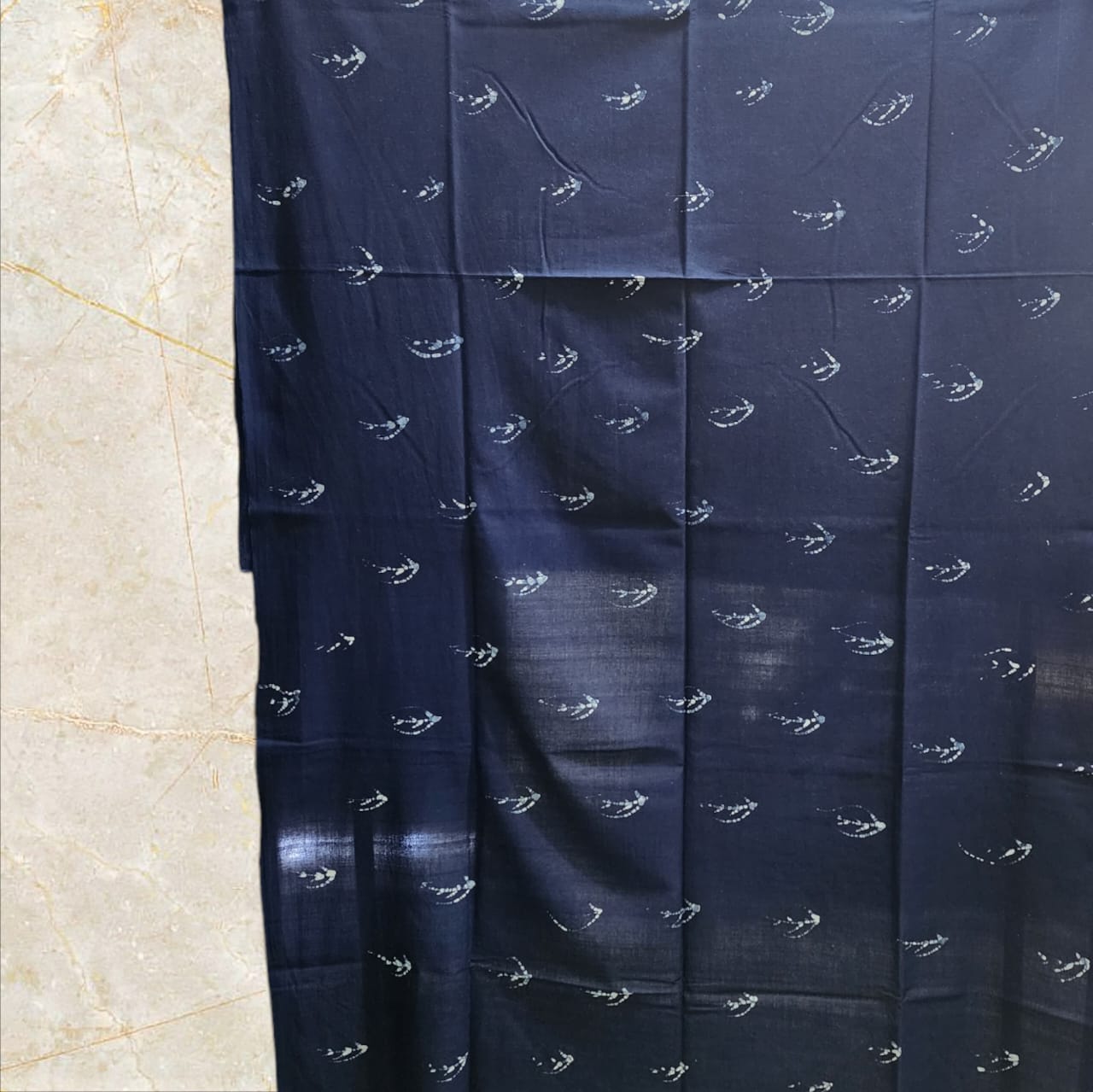 Indigo wax painted fabric